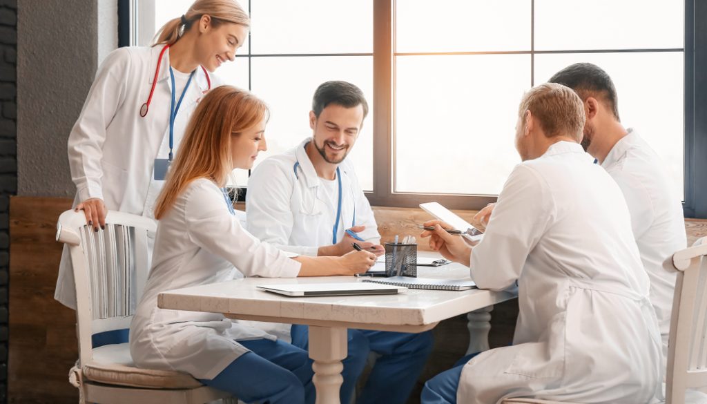 Doctors,At,Meeting,In,Modern,Clinic