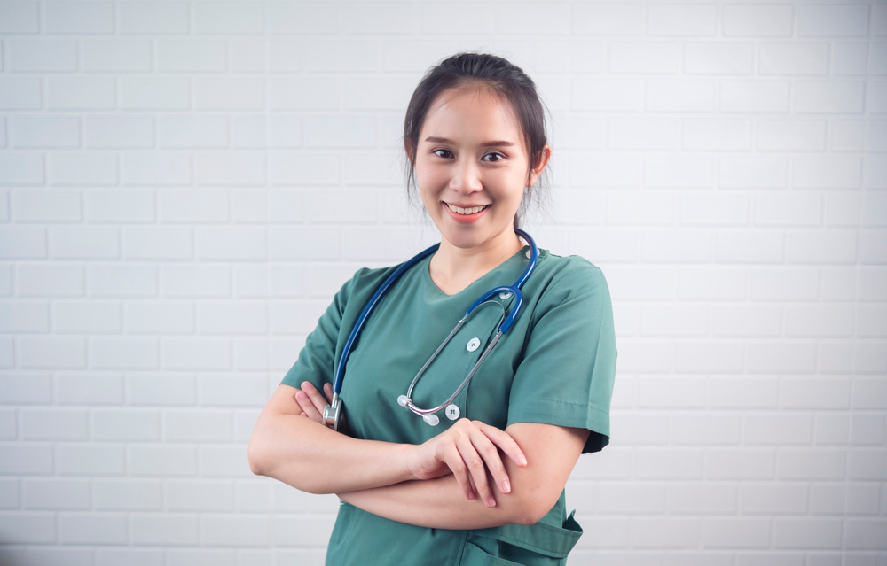 Asian,Female,Doctor,Healthcare,Worker,Confident,Strong,Happy,Smiling,Cheerful,