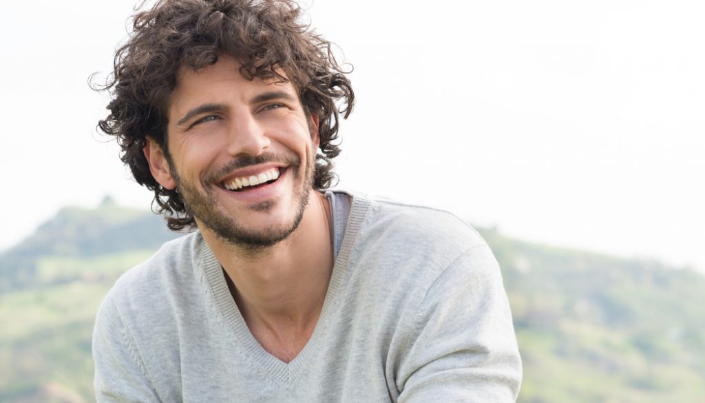 Portrait,Of,Young,Handsome,Man,Smiling,Outdoor