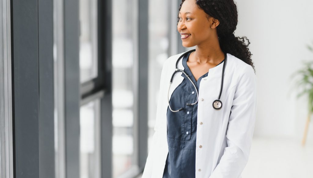 Portrait,Of,African,Female,Doctor,At,Workplace