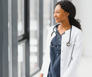 Portrait,Of,African,Female,Doctor,At,Workplace